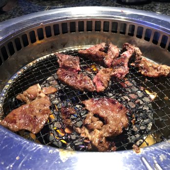 Iron Age Glenview - Bulgogi marinaded beef on mesh grill. - Barbeque Near Me - Glenview, Illinois Iron Age Glenview - Bulgogi marinaded beef on mesh grill. - Barbeque Near Me - Glenview, Illinois