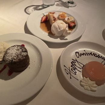 Roy's Hawaii Kai - Melting Dark Chocolate Souffle, bread pudding, and panna cotta - Hawaiian Near Me - Honolulu, Hawaii Roy's Hawaii Kai - Melting Dark Chocolate Souffle, bread pudding, and panna cotta - Hawaiian Near Me - Honolulu, Hawaii