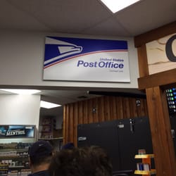USPS - Inside the Shell gas station Food Mart.