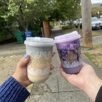 Coffeeholic House - Dark night (Left): a black sesame coffee drink and Purple Haze (Right): Coffee with Ube foam and drizzle. Both absolutely delicious. - Coffee & Tea Near Me - Seattle, Washington
