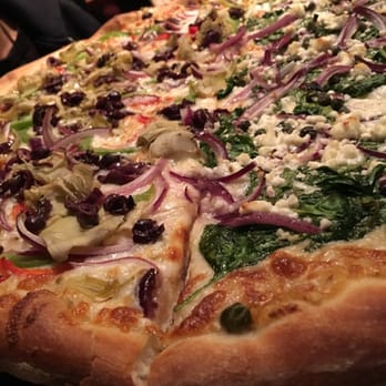 Rocco's - Pizzas here are ginormous and they're cool with going halfsies - Bars Near Me - Seattle, Washington Rocco's - Pizzas here are ginormous and they're cool with going halfsies - Bars Near Me - Seattle, Washington