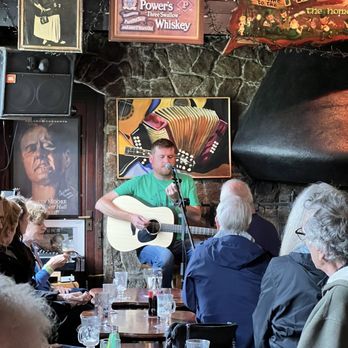 Marine Bar - Owen O'Neil on acoustic guitar - Pubs Near Me - Dungarvan, WD