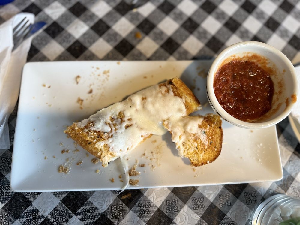 Alex's Pizza Pasta and Subs Godley Logo