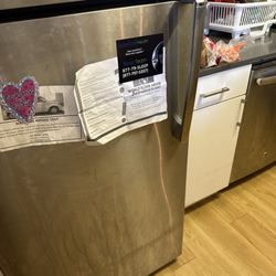 Northglen Apartments - Samuel was nice enough to fix our fridge!