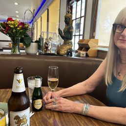 Wifey enjoying white wine and a Singha beer for me. Wifey enjoying white wine and a Singha beer for me.