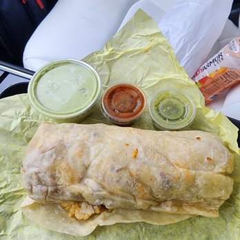 J & S - Deluxe Breakfast Burrito with a side of guac and salsa that's out of this world. - Mexican Near Me - Montebello, California