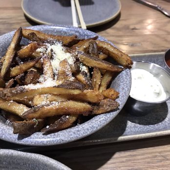 Moku Kitchen - Garlic truffle oil fries - Cocktail Bars Near Me - Honolulu, Hawaii Moku Kitchen - Garlic truffle oil fries - Cocktail Bars Near Me - Honolulu, Hawaii