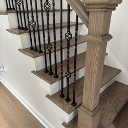 Remodeling Work 123 - New hardwood steps, stair treads, and iron pickets and new handrail and oak wood post. #remodelingwork123 
Gwinnett county