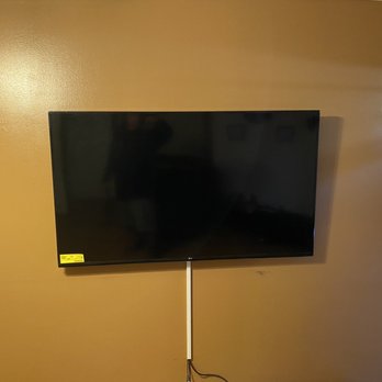 Happy Modern Homes - 72" Television - TV Mounting Near Me