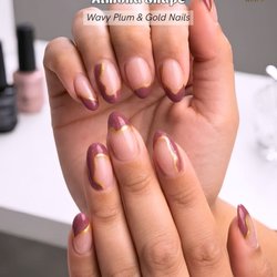Ohana Nails - Plum tones, wavy French tips, and a touch of gold.  #ohananails #nailsalon #almondnails #plumnails #goldnails #plumandgoldnails #wavynai