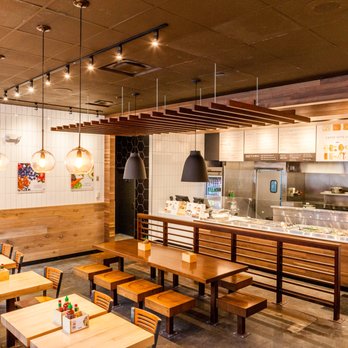 Currito - a restaurant with wooden tables and benches - Mexican Near Me - Aberdeen, Maryland