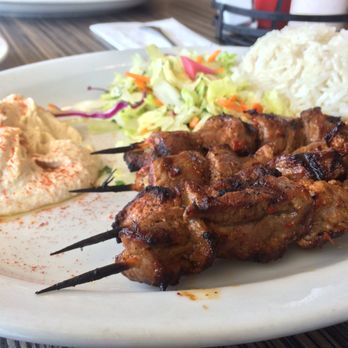 Sultan's Kebab - Lamb Shish Plate. Sticks were turning to ash since they couldn't handle the heat. - Mediterranean Near Me - Pleasanton, California Sultan's Kebab - Lamb Shish Plate. Sticks were turning to ash since they couldn't handle the heat. - Mediterranean Near Me - Pleasanton, California