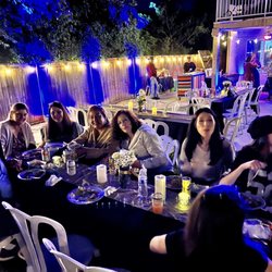 Skyfox Entertainment - Set up the uplighting all around the back yard and inside