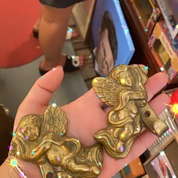 Aida’s Place - fun cherub wall hooks - Antiques Near Me - Palm Springs, California