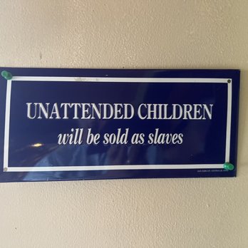 White Wolf Inn & Restaurant - a sign on the wall - Burgers Near Me - Eustis, Maine