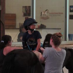Rocking Horse Rehab - Rear facing position to help develop core stability in a Hippotherapy session.