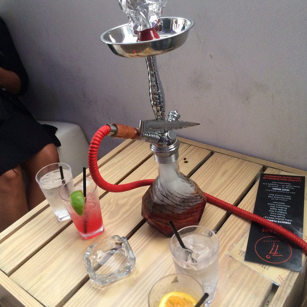 77 Degrees Rooftop - Table with hookah - Cocktail Bars Near Me - Austin, Texas