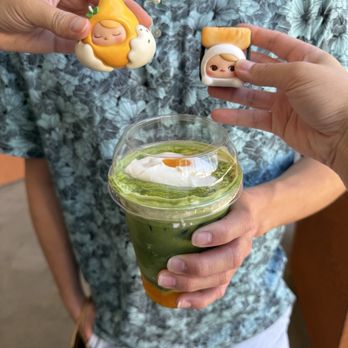 Ceré Tea - Cute  on top of the matcha tea ( it is actually mango and milk ) - Bubble Tea Near Me - Milpitas, California