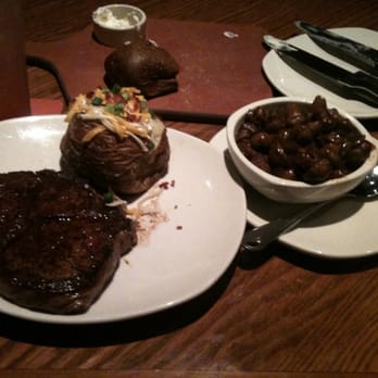 Outback Steakhouse - Ribeye w/ mushrooms and a loaded baked potatoe - Steakhouses Near Me - Asheville, North Carolina