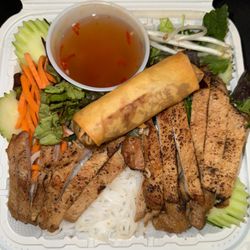 Sizzling T’s - Pork Salad with nuoc cham sauce and an egg roll