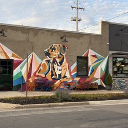 The Stray - Mural on side of building.