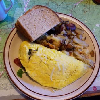 College Cafe - Leprechaun omlet with corned beef, spinach, bacon and cheese. Wonderful! - Breakfast & Brunch Near Me - Durango, Colorado College Cafe - Leprechaun omlet with corned beef, spinach, bacon and cheese. Wonderful! - Breakfast & Brunch Near Me - Durango, Colorado