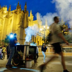 Totally Spain & Portugal - Evening life unfolds beside Seville Cathedral, where historic landmarks and local traditions create unforgettable moments.