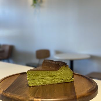 Cafe SeeSaw - a piece of cake on a wooden plate - Cafes Near Me - Suwanee, Georgia Cafe SeeSaw - a piece of cake on a wooden plate - Cafes Near Me - Suwanee, Georgia
