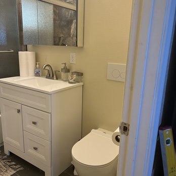 ADED Construction - Wall mount toilet with in wall tank. - General Contractors Near Me