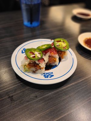 Kura Revolving Sushi Bar by null