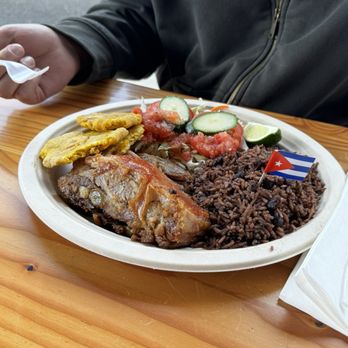 Azucar Cuban Cuisine - Pork shoulder, tostones, black beans and rice and side salad. - Cuban Near Me - Hillsboro, Oregon Azucar Cuban Cuisine - Pork shoulder, tostones, black beans and rice and side salad. - Cuban Near Me - Hillsboro, Oregon