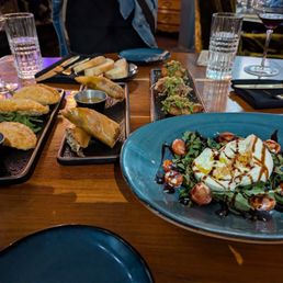 Duck Confit Spring Rolls, Pernil Lovers (GF), Chicken Empanada and Truffle Burrata (GF) Duck Confit Spring Rolls, Pernil Lovers (GF), Chicken Empanada and Truffle Burrata (GF)