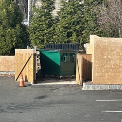 Waste Management-White Bros - Another job well done Don't bother closing the gates or pushing the dumpster back in place, I'm sure you've got better things to do