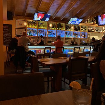 Sylvano’s - people sitting at a bar - Italian Near Me - Miami, Florida