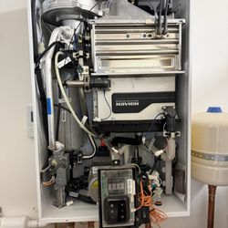 Pipeline Plumbing - Working on a Navien tankless water heater cross connection issue. Let us know if your hot water suddenly goes Luke warm or cold!