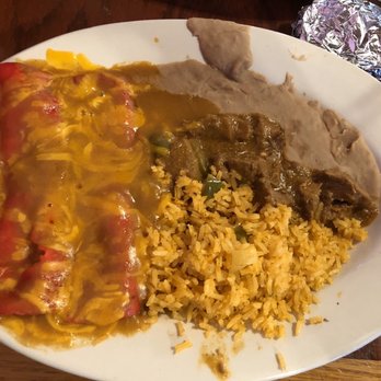 Ray's Drive Inn - Mexican plate with 2 cheese enchiladas, spanish rice, refried beans and carne guisada. (Taco off to the right) - Tex-Mex Near Me - San Antonio, Texas Ray's Drive Inn - Mexican plate with 2 cheese enchiladas, spanish rice, refried beans and carne guisada. (Taco off to the right) - Tex-Mex Near Me - San Antonio, Texas