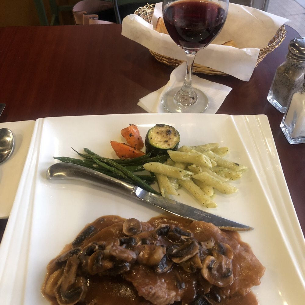 Garibaldi's - Veal marsala, with a side of pasta and perfectly seasoned and prepared veggies - Italian Near Me - Carson City, Nevada Garibaldi's - Veal marsala, with a side of pasta and perfectly seasoned and prepared veggies - Italian Near Me - Carson City, Nevada