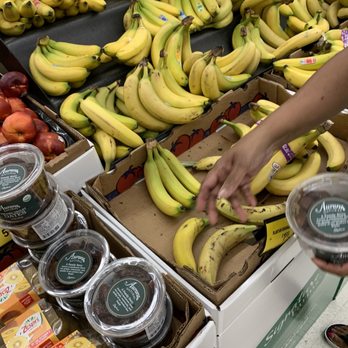 ACME Markets - a person picking a bunch of bananas - Grocery Near Me - Ocean City, Maryland ACME Markets - a person picking a bunch of bananas - Grocery Near Me - Ocean City, Maryland