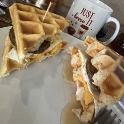 Delta Bean Coffee Bar and Cafe - I enjoy savory and sweet meals! This waffle, egg, cheese, and sausage plate was pretty good; my only issue was the tiny sausage patty.