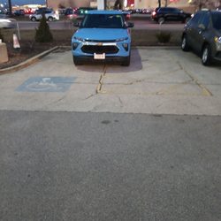 Golf Mill Chevrolet - A dealer vehicle taking up a handicapped parking.as I have no toes and needed to park in there fueling spot.