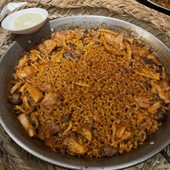 Jaleo - Arroz de pollo y setas - paella-style rice with chicken and seasonal mushrooms ($70) - Spanish Near Me - Las Vegas, Nevada Jaleo - Arroz de pollo y setas - paella-style rice with chicken and seasonal mushrooms ($70) - Spanish Near Me - Las Vegas, Nevada