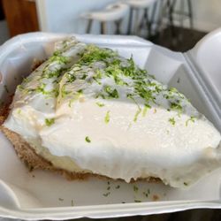 Key West Lime Pie, topped with whipped cream & fresh lime zest. Soft, tart, sweet, citrusy, crunchy, yum!