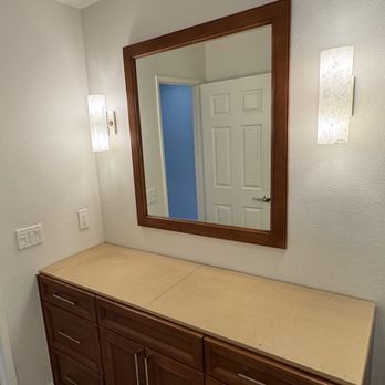 Closet La Quinta Cabinetry - Cabinet and mirror ready for the countertop install. - Cabinetry Near Me - Palm Desert, California Closet La Quinta Cabinetry - Cabinet and mirror ready for the countertop install. - Cabinetry Near Me - Palm Desert, California