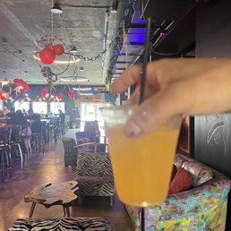 Orange kratom and background of the Kava bar. Orange kratom and background of the Kava bar.