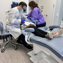 Creekside Kids Dentistry Walnut Creek - Dentist with assistant, fillings