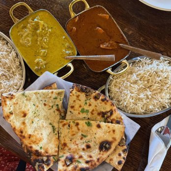 Tap N Tikka - Butter Chicken (Red) & Malai Goat (Mom's recipe) (Yellow) + quite good Garlic Naan - Indian Near Me - Gilbert, Arizona Tap N Tikka - Butter Chicken (Red) & Malai Goat (Mom's recipe) (Yellow) + quite good Garlic Naan - Indian Near Me - Gilbert, Arizona