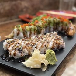 Tokyo Japanese Steakhouse Seafood & Sushi Bar - Perfect Simple eel & avocado in front, Green Dragon Inside Out Roll in back.