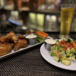 The Nashville Tap House - Wings and salad with blue cheese all around