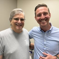 Palm Beach Orthopaedic Institute - Ten days after a hip replacement, a happy patient poses with Dr. Jonathan Shaw.