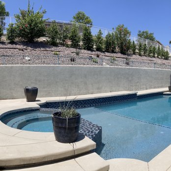 FM Pool Construction - After - we love the landscaping too.  And check out the new Baja shelf! - Pool & Hot Tub Service Near Me